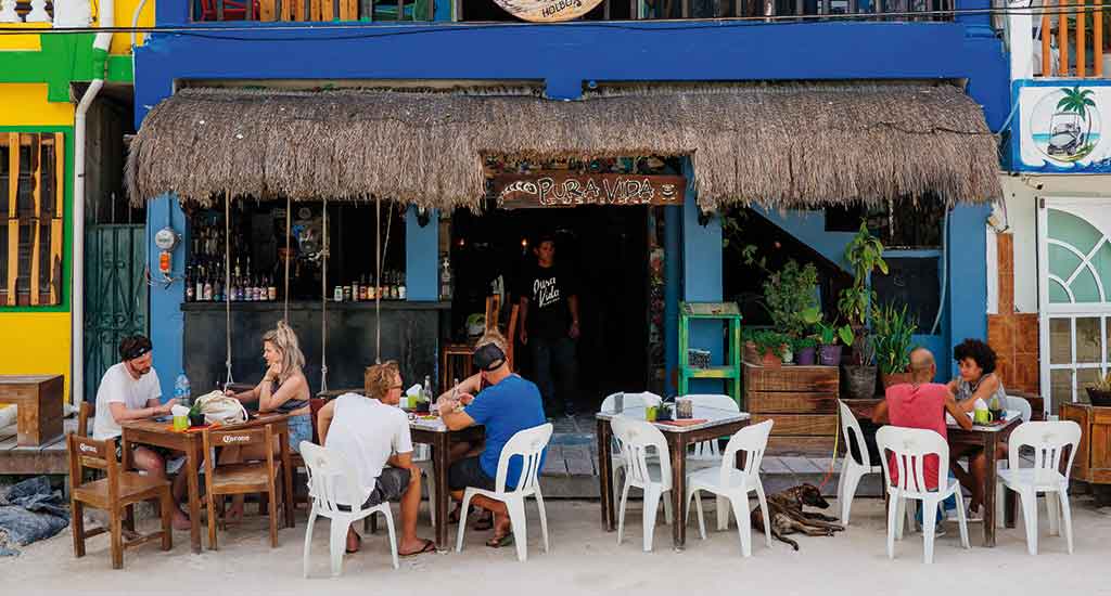 Tourists eating in Holbox Mexico