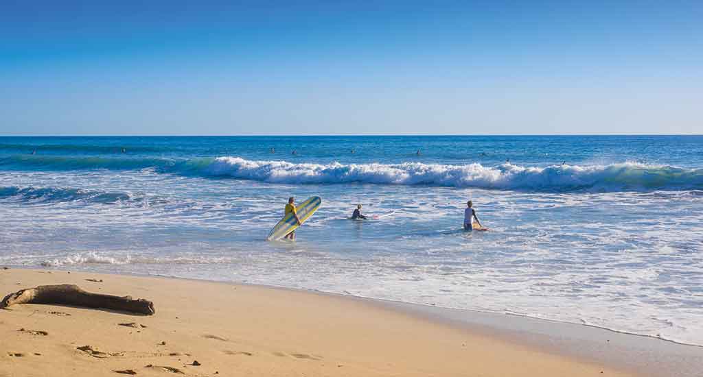 Surfers on Playa Santa Tereasa Costa Rica