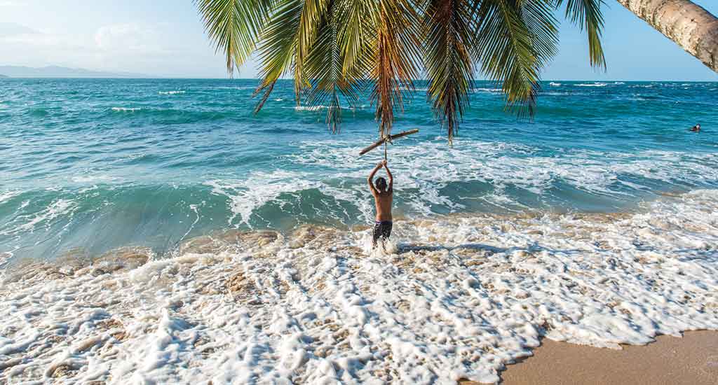 Man in Punta Uva beach in Costa Rica