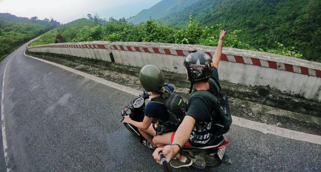 Drivers on a motorbike on Hai Van Pass