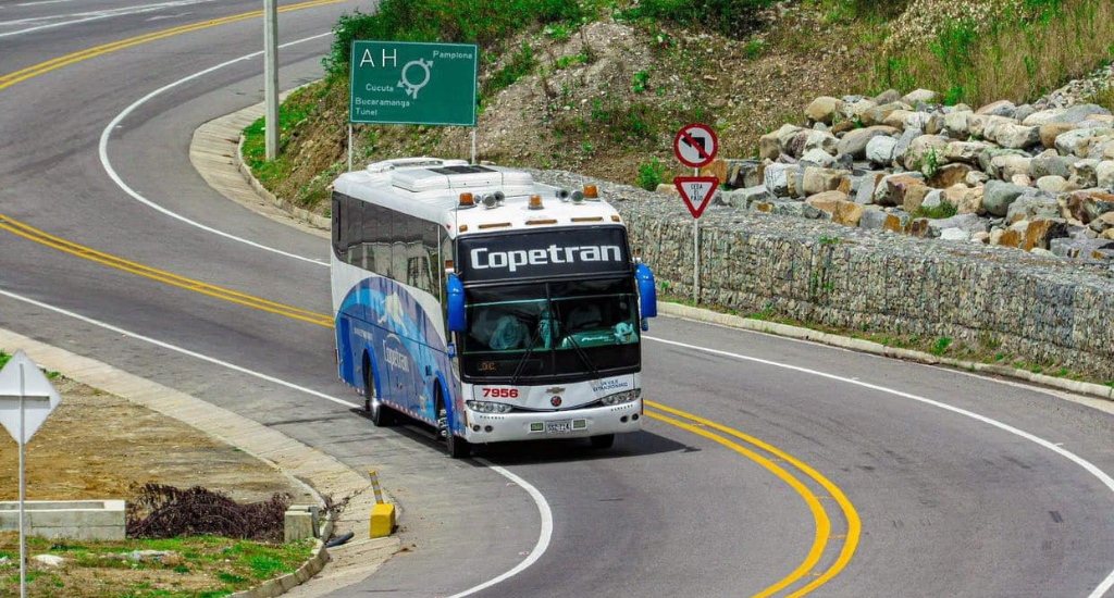 Copetran bus running along a highway in Colombia